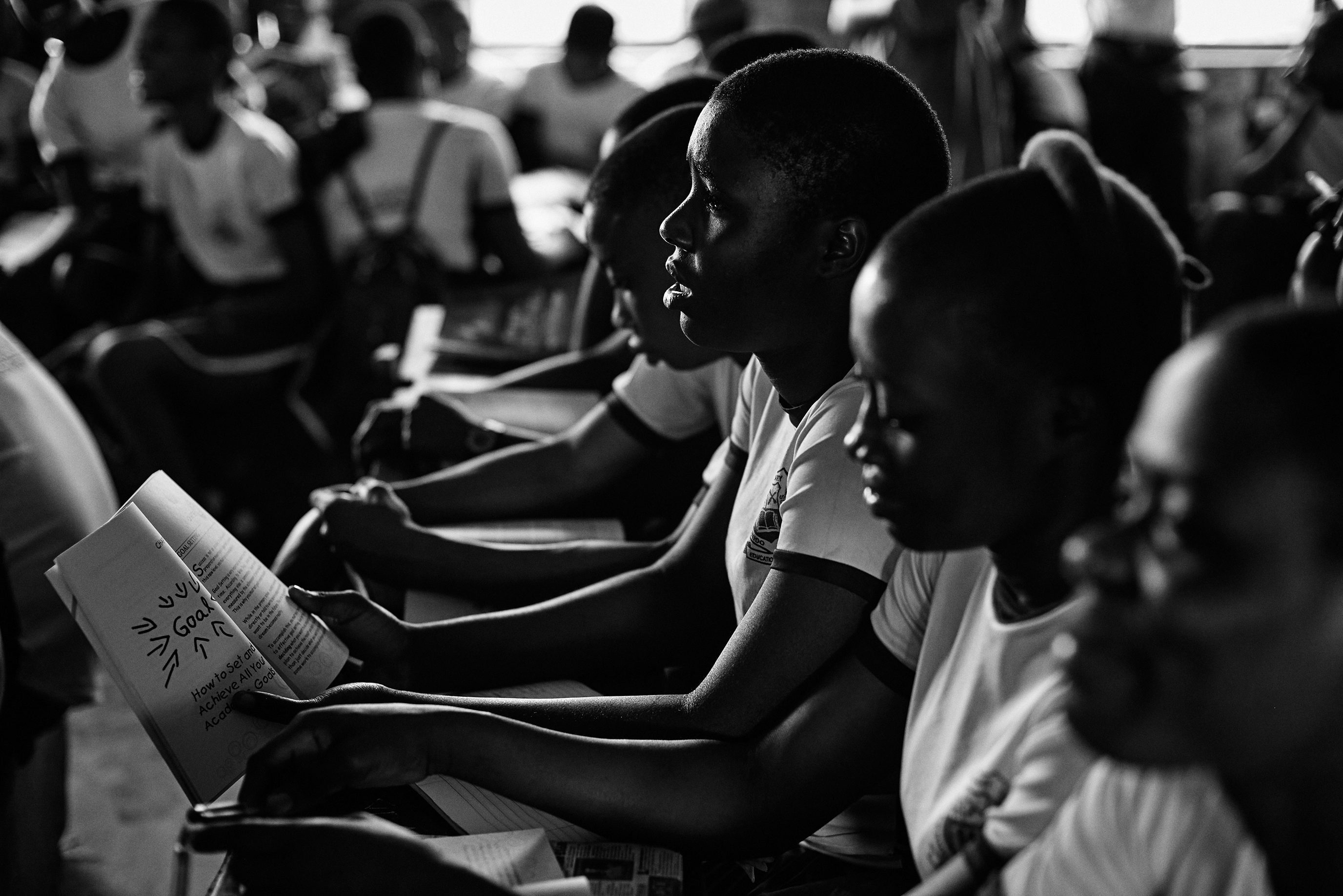 Secondary school students reading together